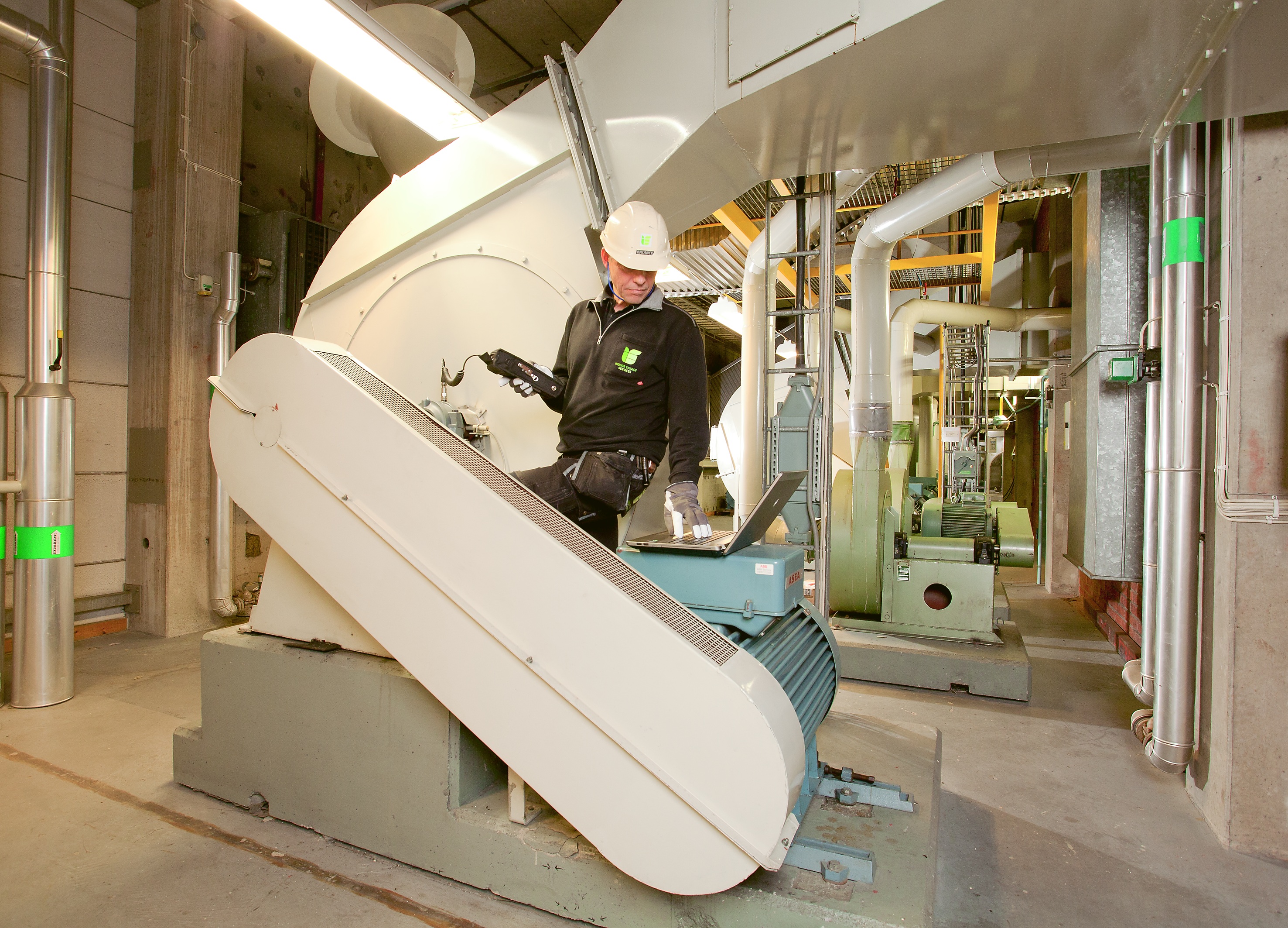 Man using Leonova Diamond for field measurements in industrial environment